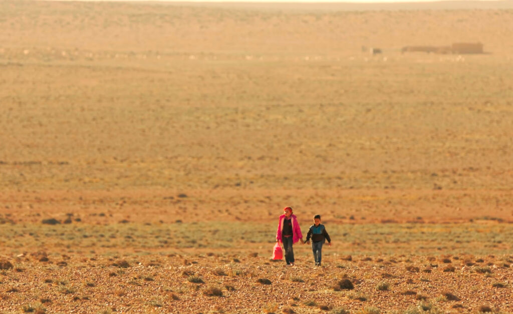 children walking to school in School of Hope